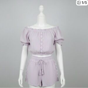 Lilac Ruffled Top and Shorts Set Size Small Pit to Pit 18”. Waist 11” to 14”.